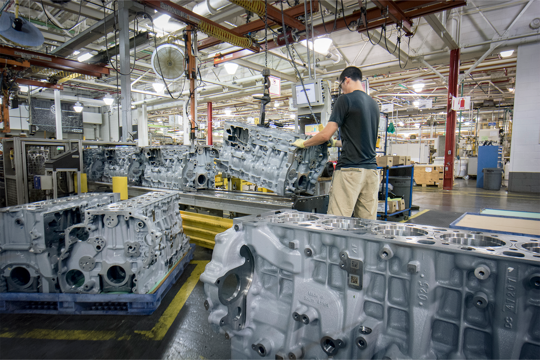 An employee working in a Demand Detroit manufacturing plant.